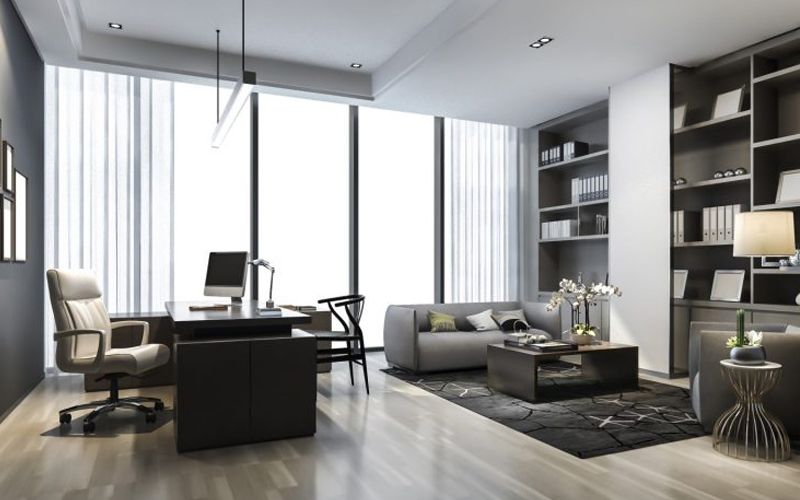 Mẫu decor phòng giám đốc với bàn làm việc cao cấp, sofa tiếp khách và kệ sách hiện đại