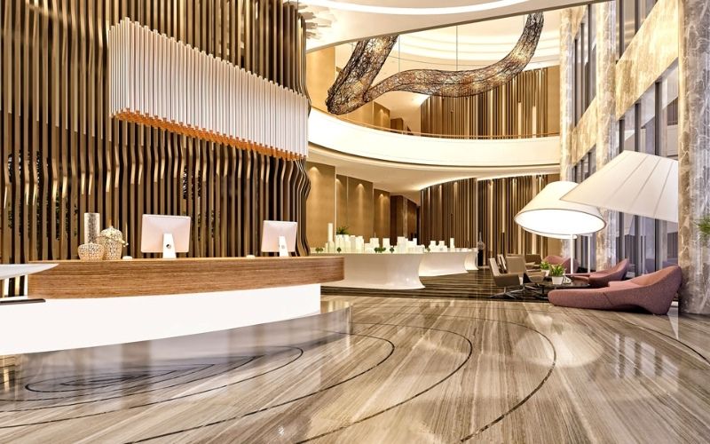Thiết kế quầy lễ tân phong cách Luxury tạo ấn tượng chuyên nghiệp với vật liệu cao cấp và ánh sáng tinh tế