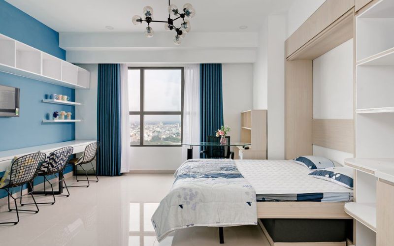 Mẫu văn phòng chung cư tối giản với gam màu xanh tạo sự tươi mát